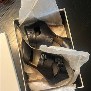 Black Heels with Buckle Detail